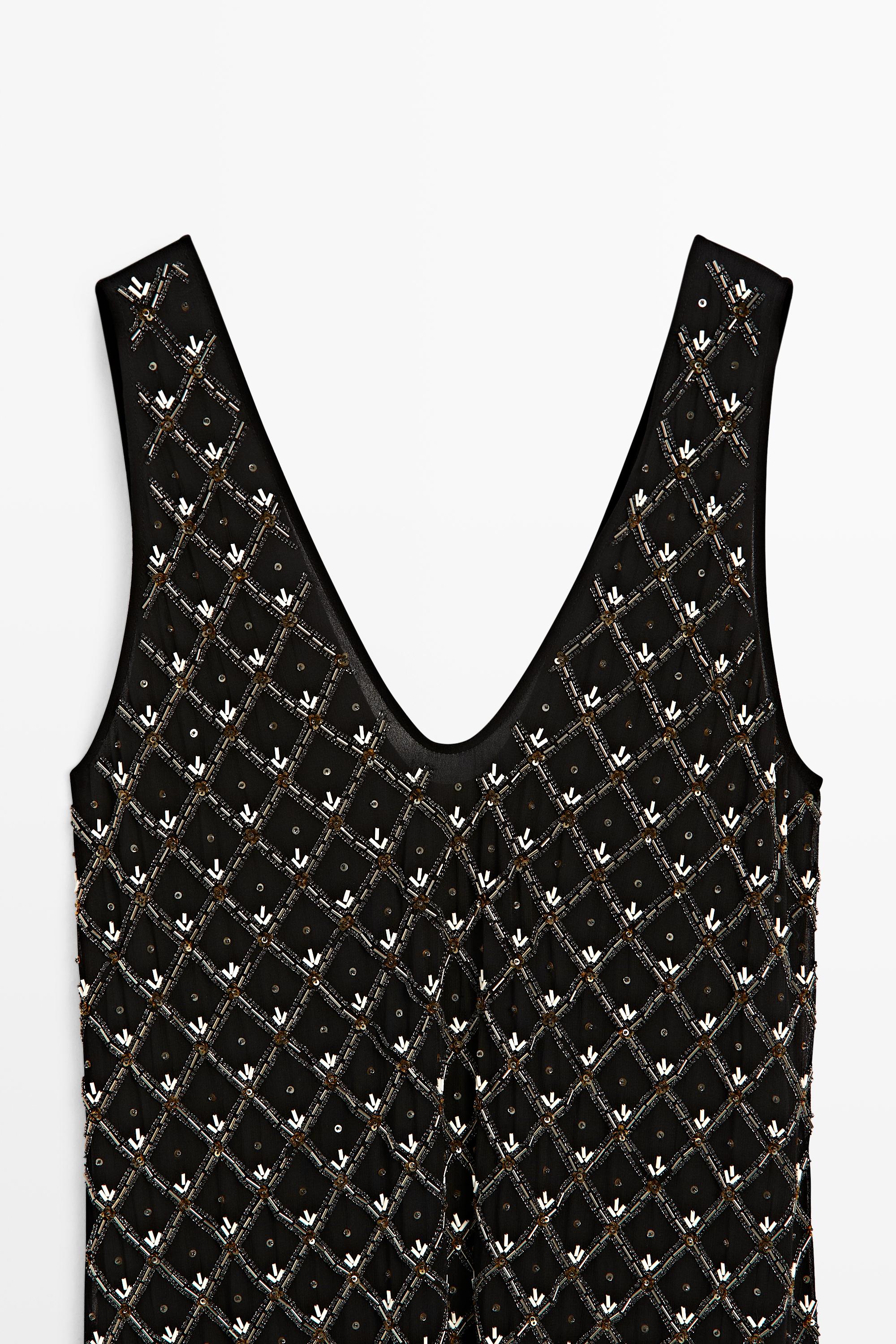 Mini dress with beaded detail
